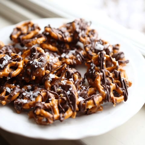Irresistible photo showcasing the delicious pretzel candy clusters, ready to be enjoyed as a snack.
