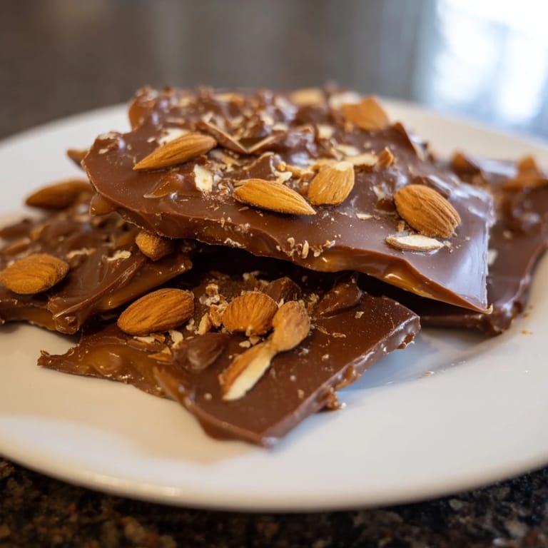 Sweet, buttery English Toffee, ready to be enjoyed, with a perfect balance of textures and flavors.