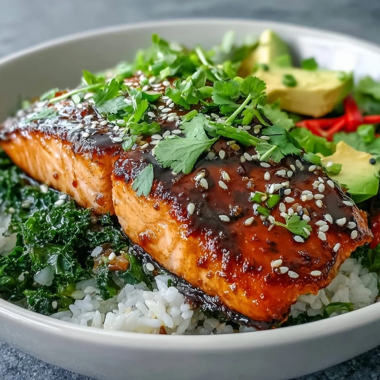 Colorful soy ginger salmon bowls feature crisp bok choy, bell peppers, and carrots, garnished with fresh cilantro and served with lime wedges.